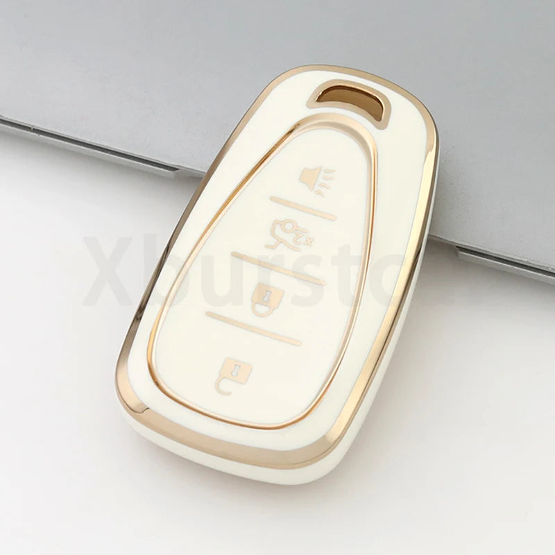 Weißes und goldenes 4-tasten TPU-Schlüsselhalter für Chevrolet-Fahrzeuge in Nahaufnahme.