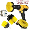 A set of three yellow and black power scrubber brushes for drill attachments.
