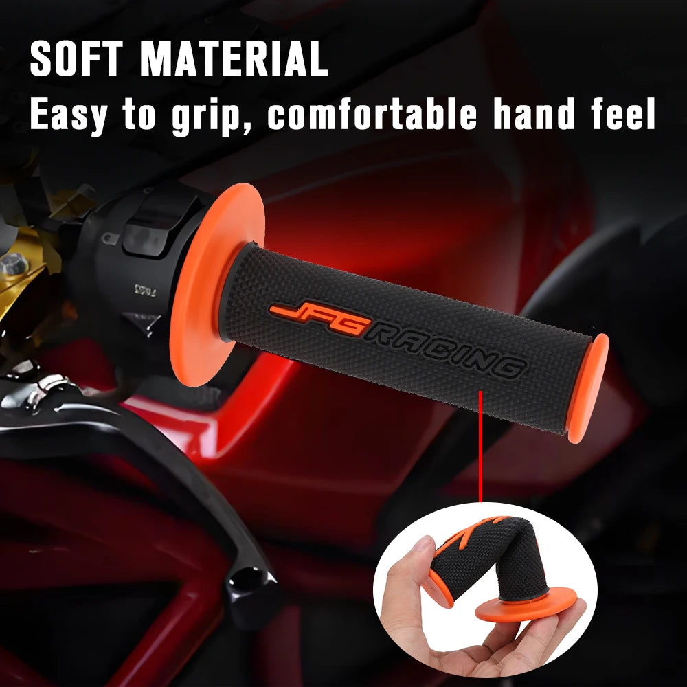 Close-up of an orange and black soft material motorcycle handlebar grip with a finger grip demonstration.