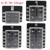 A set of six multi-way blade fuse boxes for automotive and marine systems, shown in black and silver.
