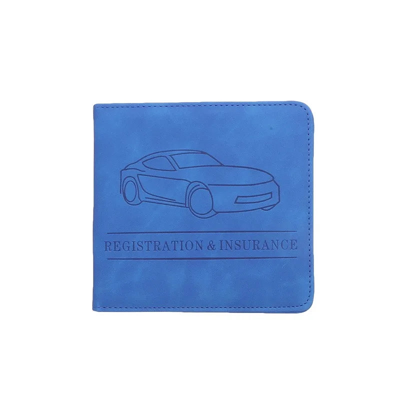 A blue leather document and ID holder with a line drawing of a car and the text Registration & Insurance.