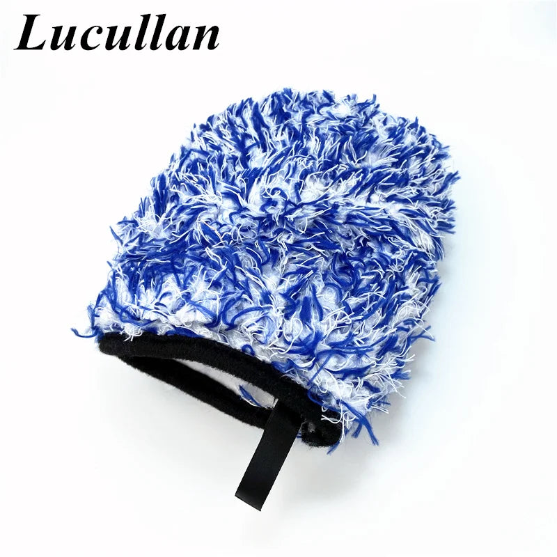 A blue and white microfiber detailing wash mitt with a black strap.