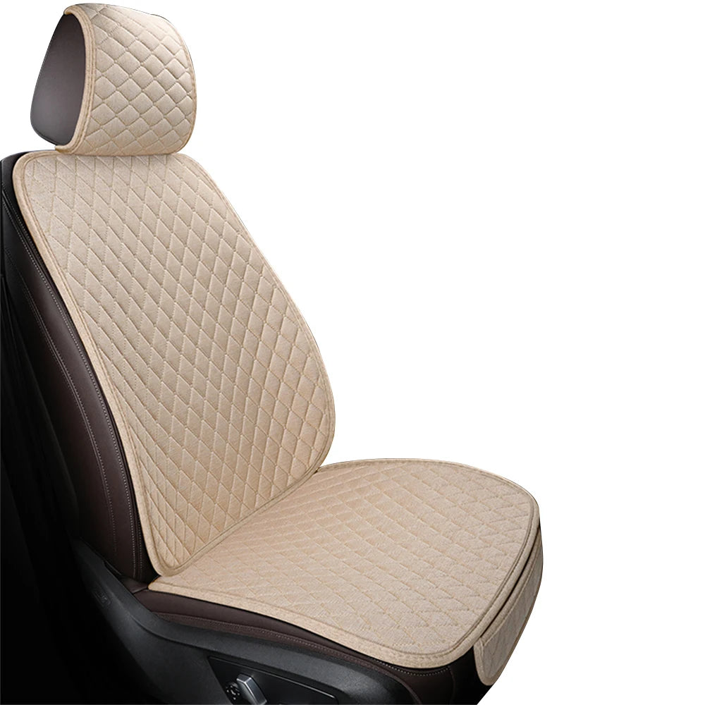 A beige quilted car seat and floor mat with dark brown upholstery shown in a side view.