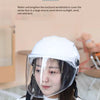 A woman wearing a clear plastic half helmet designed for protection against sunlight, wind, rain, and dust.