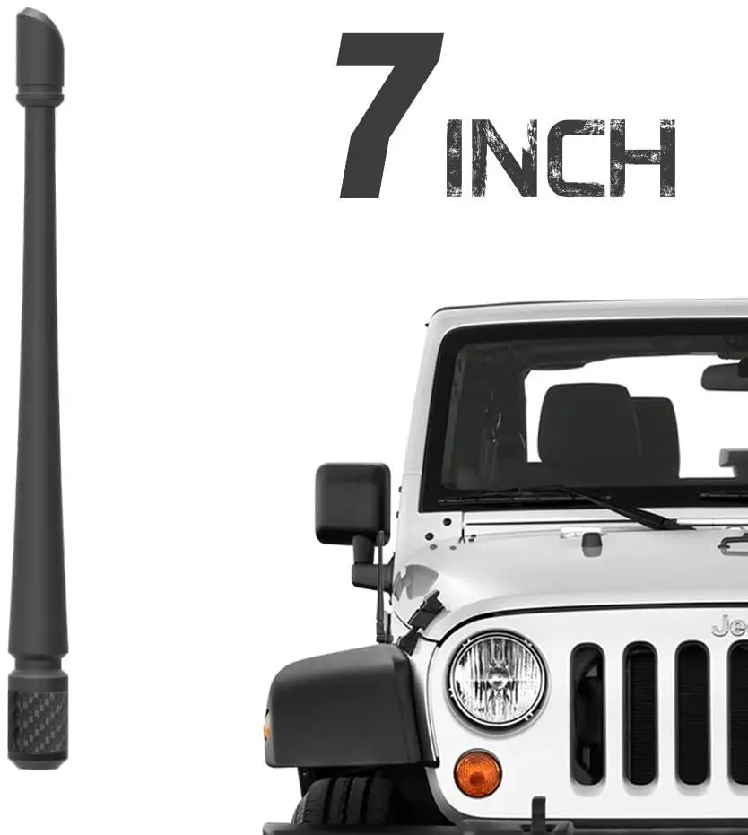 A close-up view of a 7 inch universal car antenna installed on a white vehicle.