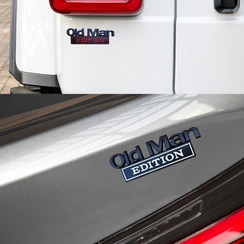A close-up of a blue Old Man Edition emblem badge on the rear fender of a silver car.