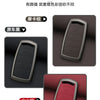 Three color options for a zinc alloy car key case, showing black and red variants.