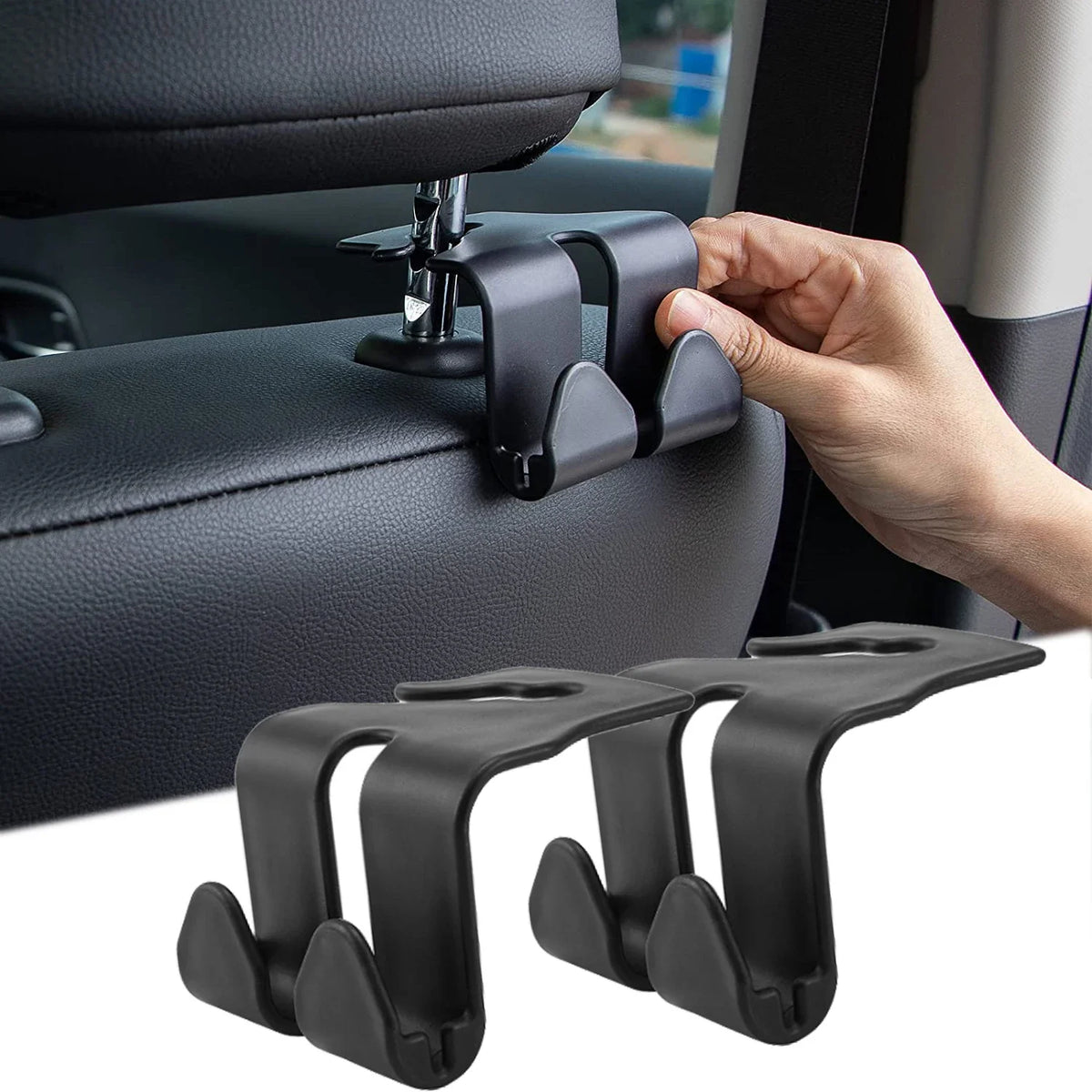 A hand is installing black universal car seat headrest hooks onto a vehicle seat.