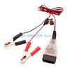 A red and black professional OBD2 battery replacement and monitoring tool with cables.