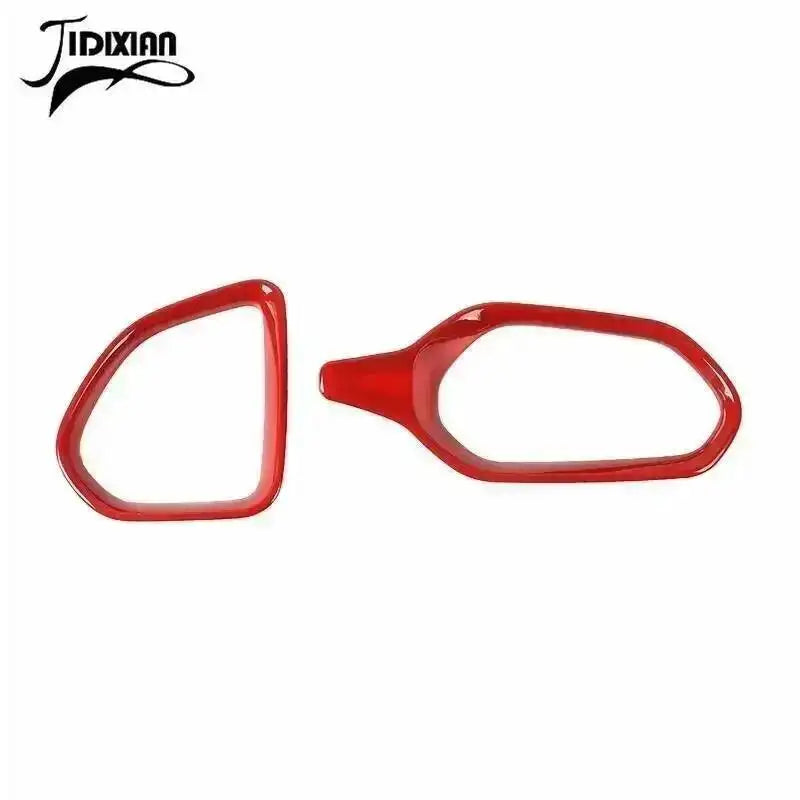 A pair of red dashboard air vent covers for a Jeep Renegade, designed for models from 2016 to 2024.