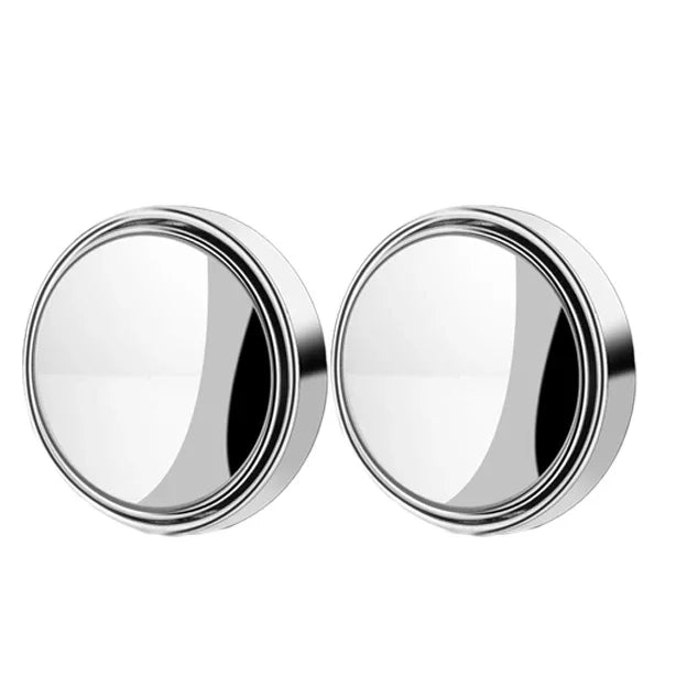 A pair of round, chrome rearview mirrors for a vehicle.