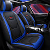 Black and blue universal car seat covers installed in a vehicle interior.