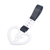 Black strap with a white heart charm and a white loop for a JDM Tsurikawa product