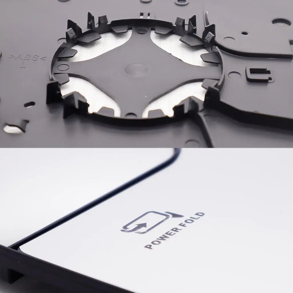 Close-up view of a black heated convex side mirror glass for a Ford F-150, showing the power fold mechanism.