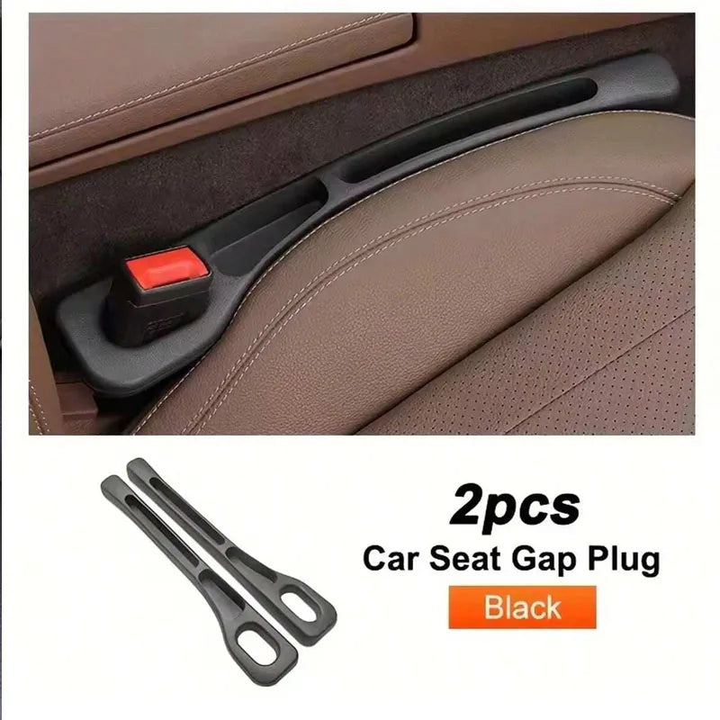 Two black car seat gap plugs used to fill the space between car seats.