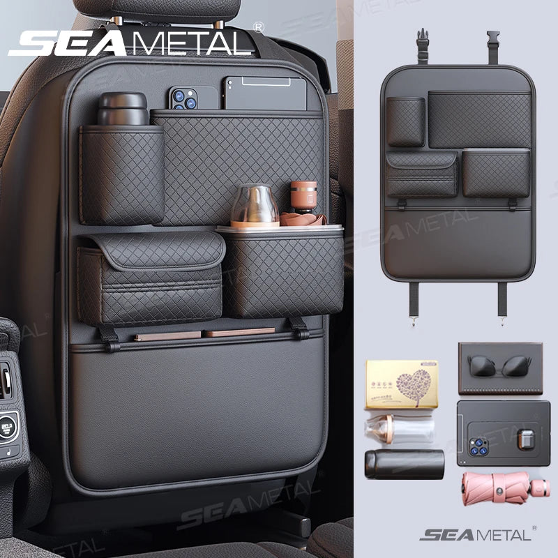 A black luxury car seat back organizer bag filled with various accessories like bottles and small items.