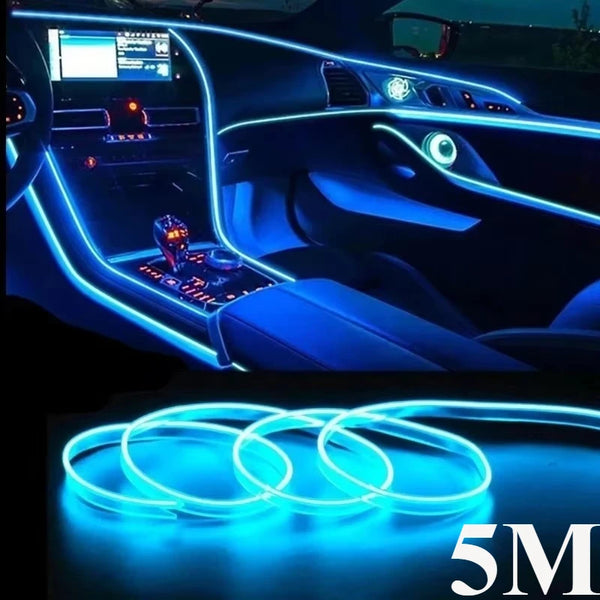 Flexible blue LED wire rings glowing in the dark interior of a car