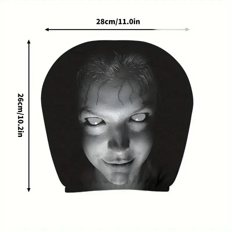 A black Halloween horror face design printed on a car headrest cover.