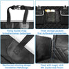 Various features of a black pet trunk liner including fixing buckle straps, storage pockets, reinforced stitching, and a magi