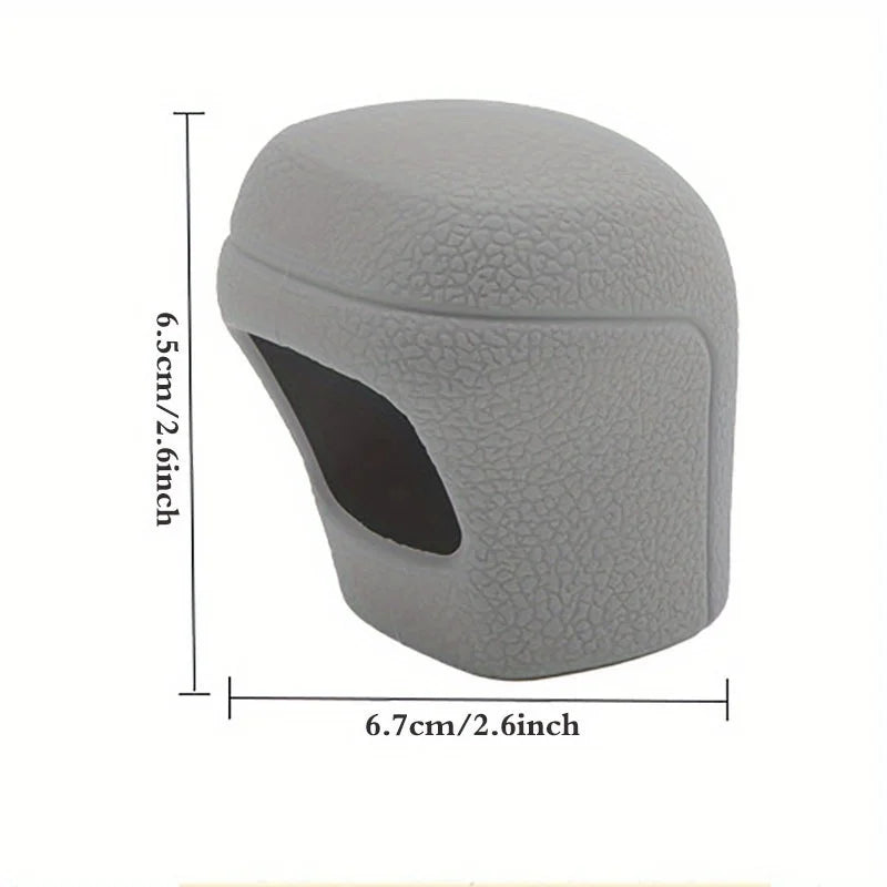 Gray universal car gear shift knob cover with a cutout for visibility