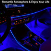 A car interior showing a flexible USB EL wire ambient light strip illuminating the dashboard and door panel.