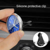A hand holds a silicone protective clip on a round watch face, demonstrating the use of a silicone protective clip.