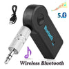 A black Bluetooth 5.0 audio adapter with a detachable microphone and cable for wireless connection.