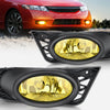 A pair of aftermarket amber fog light assemblies for a Honda Civic sedan, showing the headlight units and mounting brackets.