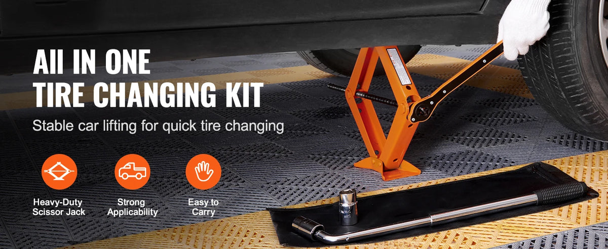 Kit de cric à pince orange avec un pneu soulevé sur un véhicule.