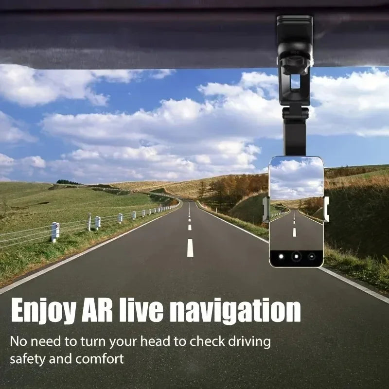 A phone holder is mounted to a car's rearview mirror, showing an augmented reality view of the road.