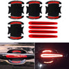 Eight reflective stickers designed to protect car door handles and provide visibility.