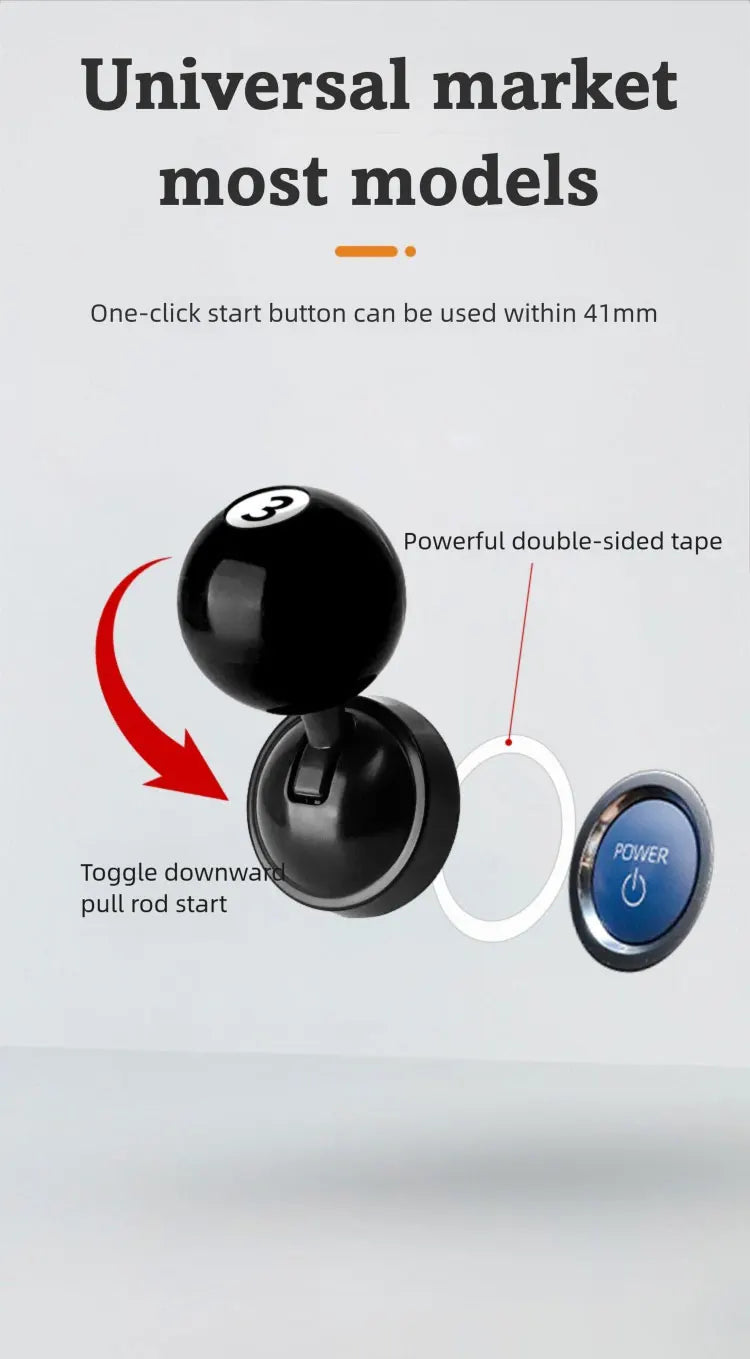 A close-up view of a black car start button cover with a toggle downward pull rod mechanism and double-sided tape.
