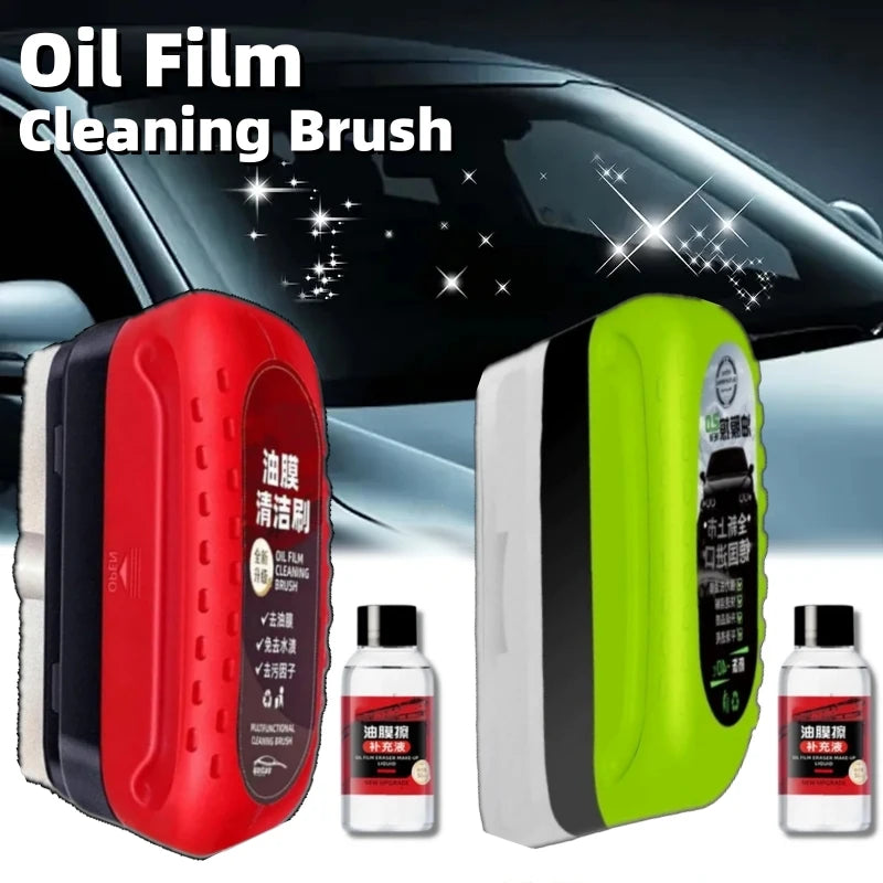 A set of red and lime green oil film cleaning brushes shown next to a car windshield.