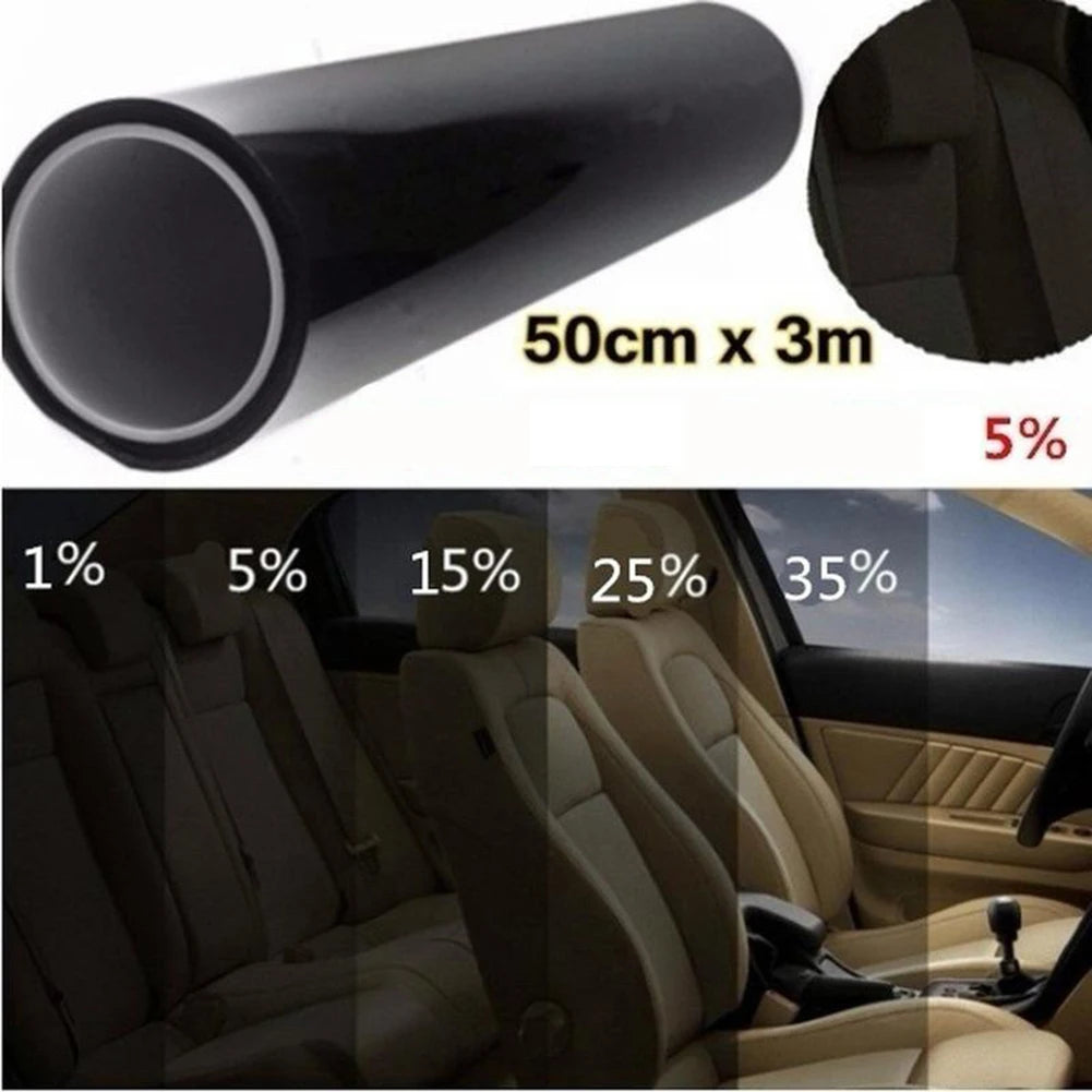 A roll of black window tint film is shown alongside a car interior demonstrating various levels of tint darkness.