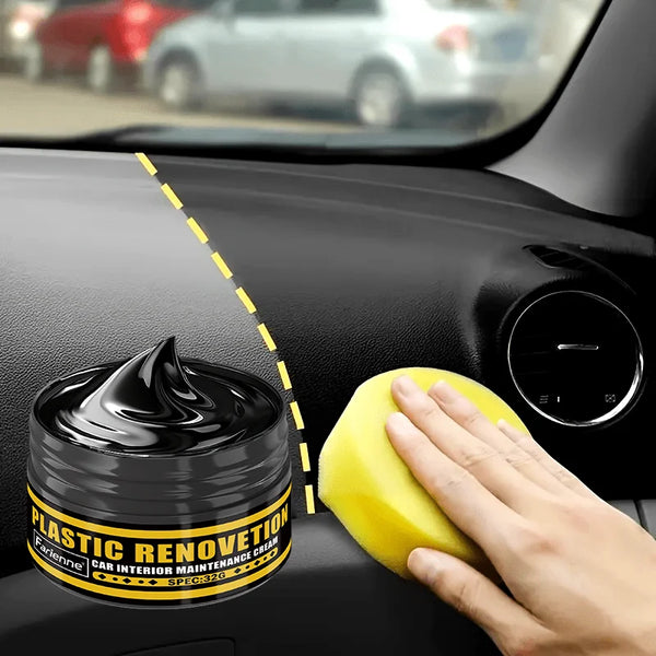 A hand applies plastic renovation cream to a car interior surface.