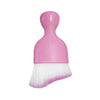A pink curved silicone brush with a white bristles is shown against a white background.