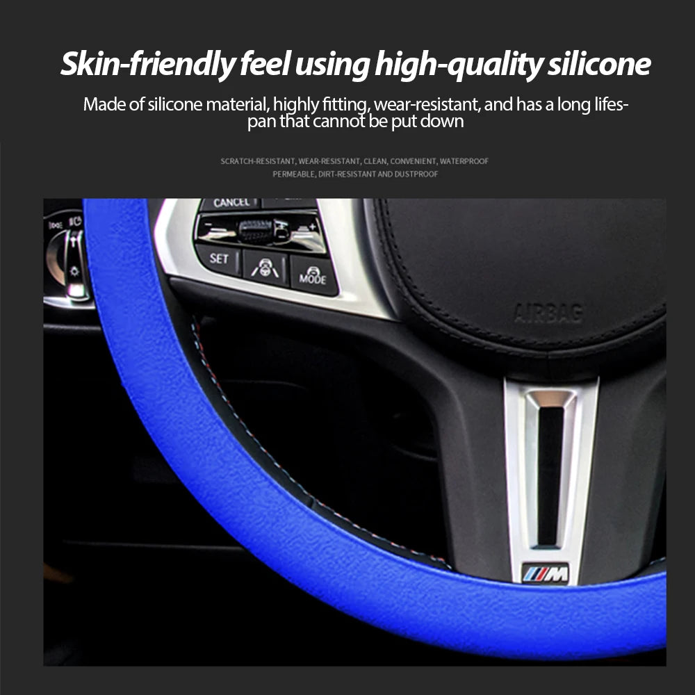 A close-up view of a blue silicone car steering wheel cover installed on a vehicle's steering wheel.