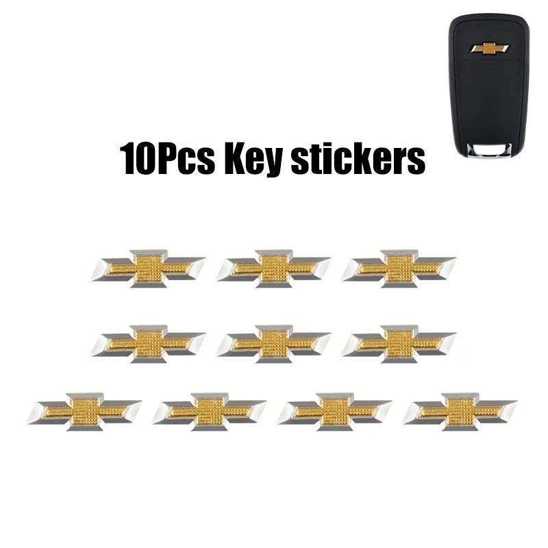 A set of ten aluminum Chevrolet key emblem stickers.
