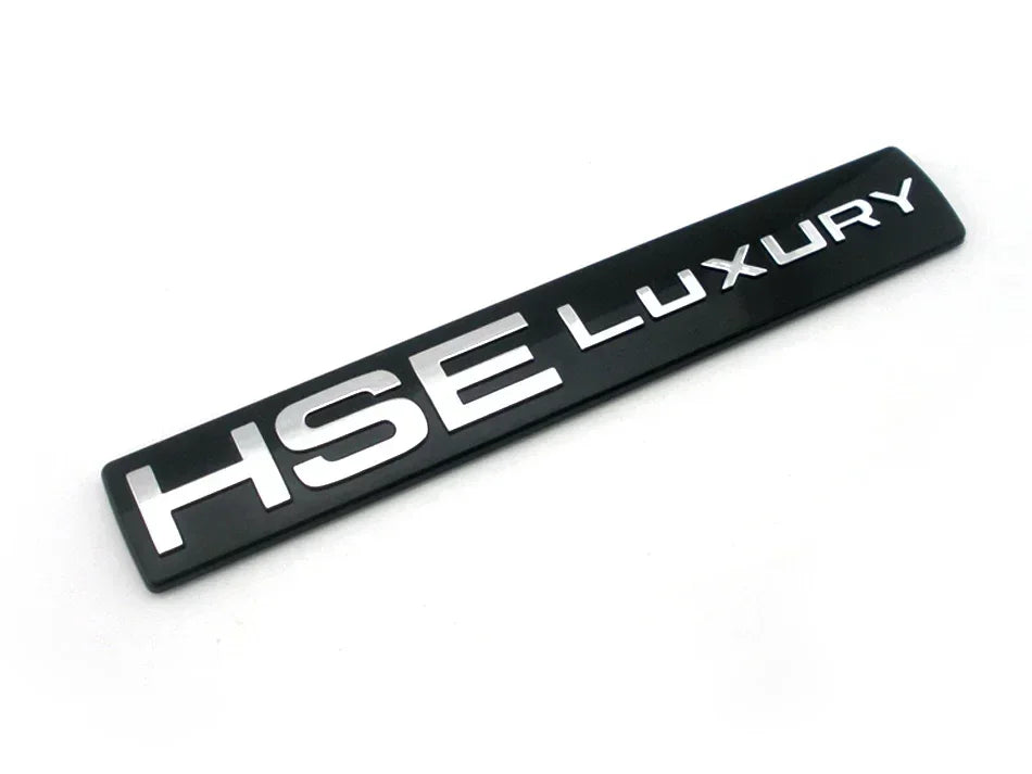 Sleek black HSE LUXURY badge decal for a Discovery 4 vehicle.