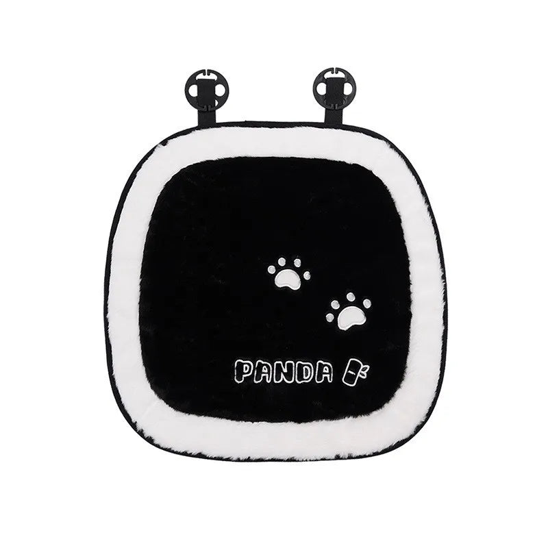A black and white cartoon panda car seat cushion set with small paw print details.