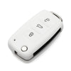 White silicone car key cover for Volkswagen models with multiple buttons.