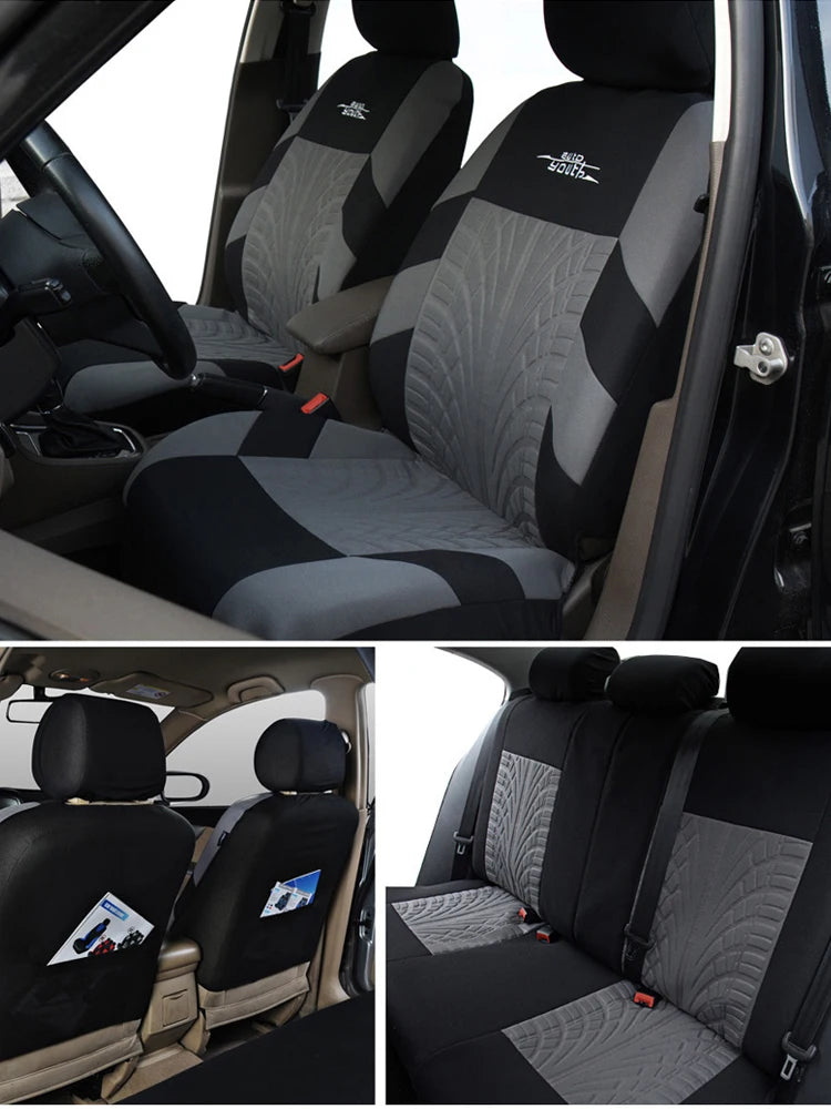 A set of black and gray universal car seat covers shown inside a vehicle cabin.