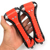 A hand holds a red heavy-duty emergency window breaker and seatbelt cutter tool.