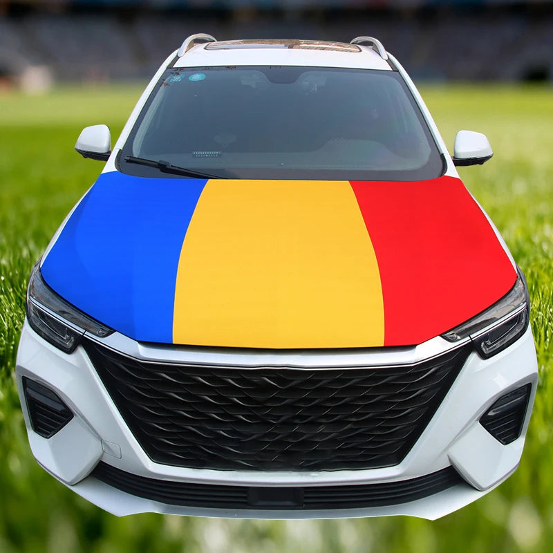 A white car hood decorated with a flag featuring blue and yellow horizontal stripes.