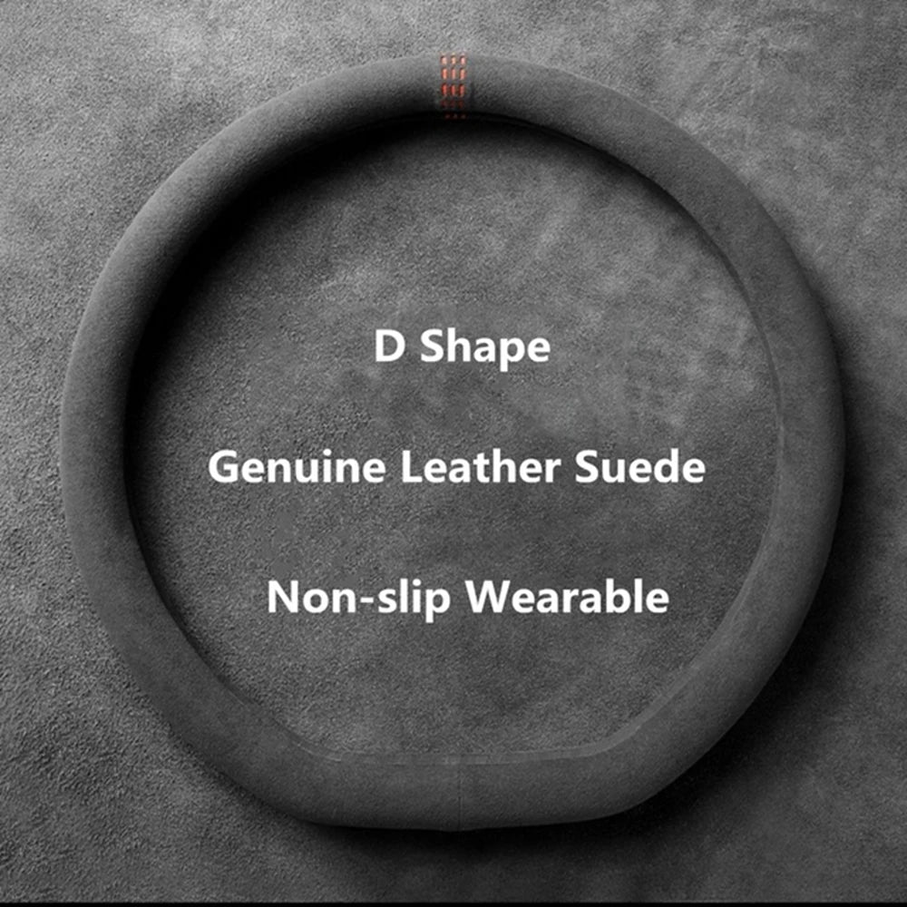 A circular black suede steering wheel cover with a D shape, designed to be non-slip and wearable.