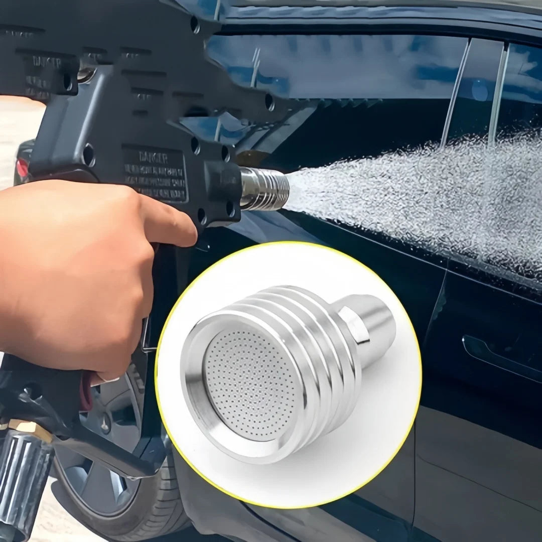 A hand is attaching a high-pressure stainless steel shower head nozzle to a car window using a specialized tool.
