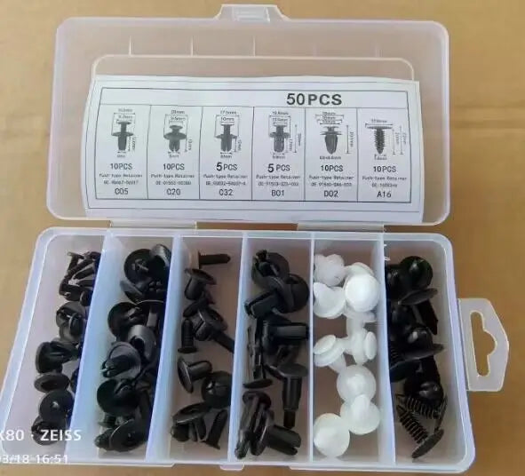 A set of universal auto fastener clips for body trim, including various sizes and types.