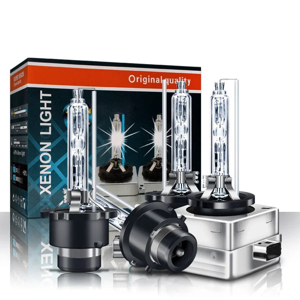 A box and several high-intensity xenon HID headlight bulbs are displayed on a silver base.