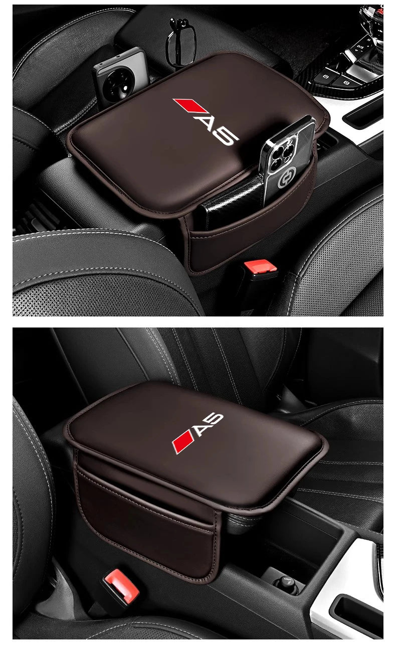 A dark brown leather car armrest protector mat with storage pockets is shown in a vehicle interior.