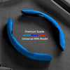 A blue suede steering wheel cover is shown against a dark background, labeled as a universal 99% model.